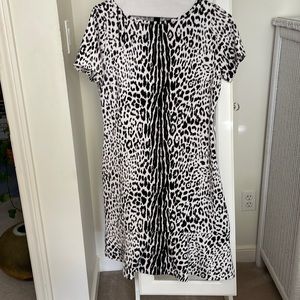 Michael Kors , animal print.  Perfect with a jacket, sweater or alone.